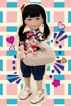 Doll with a colorful outfit and bag on a patterned background