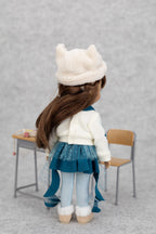 8" mini Fashion Friends doll wearing a white coat, blue skirt, and white hat with animal ears, standing in front of a gray background.