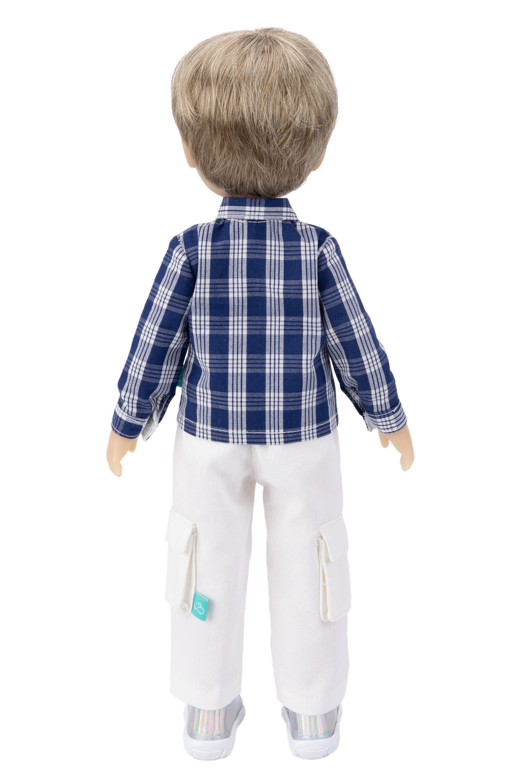Doll wearing a blue plaid shirt and white pants on a white background