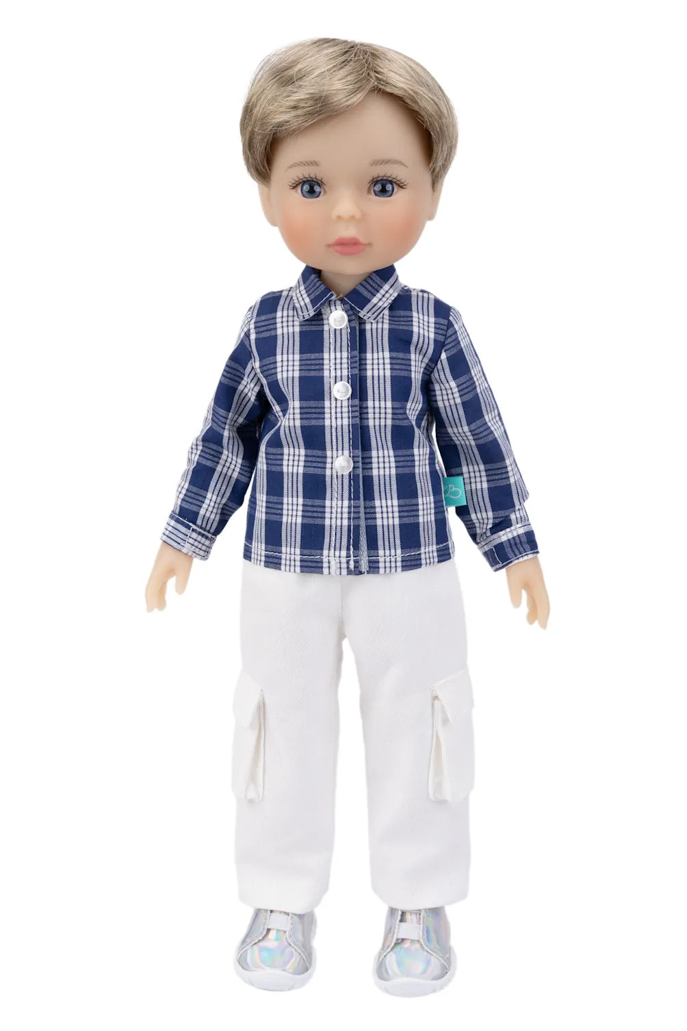 Doll wearing a blue plaid shirt and white pants on a white background