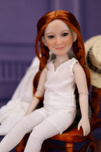 Doll with red hair wearing a white outfit sitting on a wooden chair against a purple background