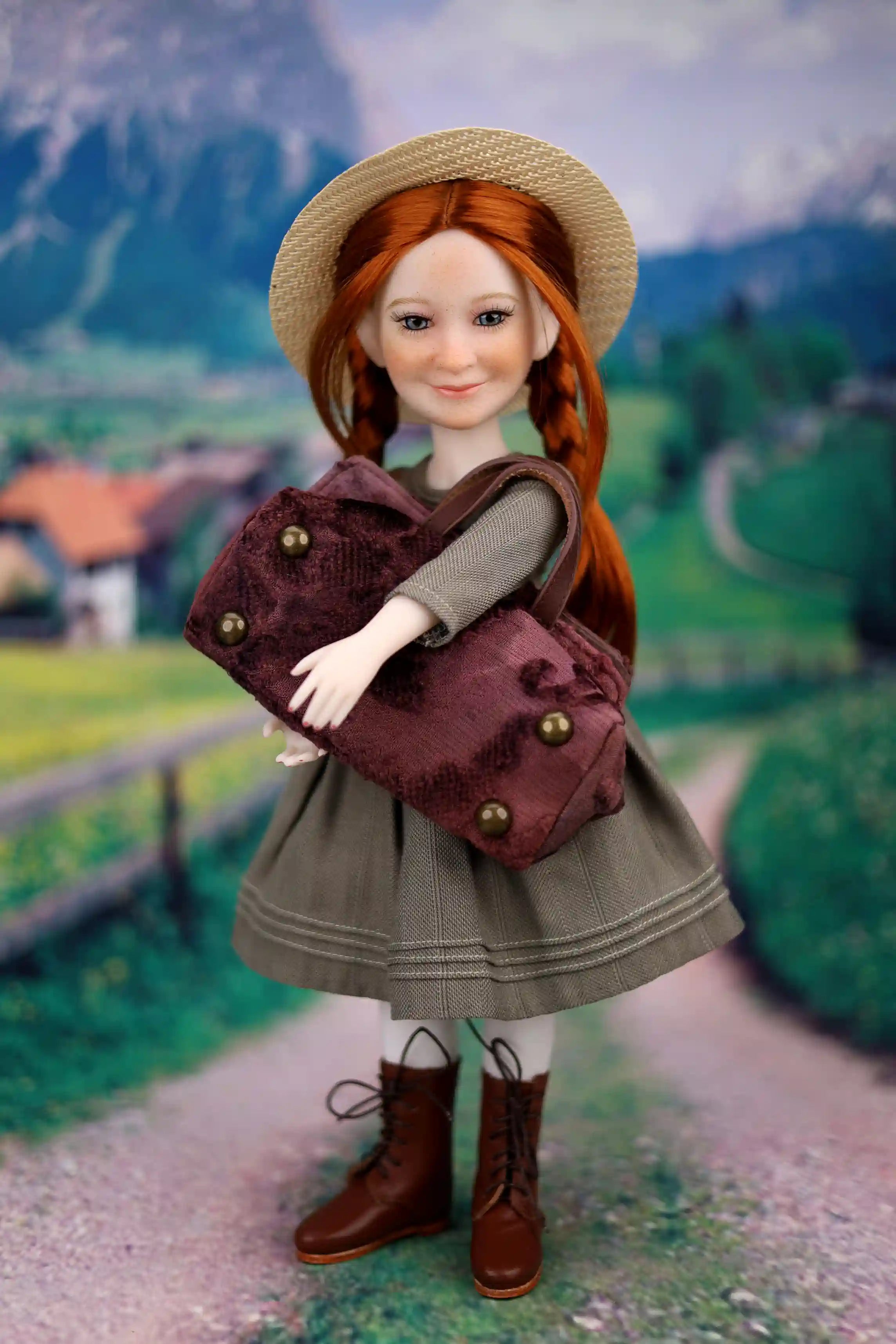 Doll with red hair and a brown bag in a scenic outdoor setting
