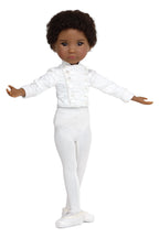 Doll wearing a white outfit on a white background