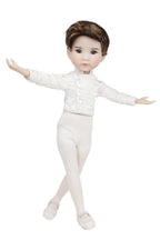 Doll in a white ballet outfit with a textured top and tights on a white background