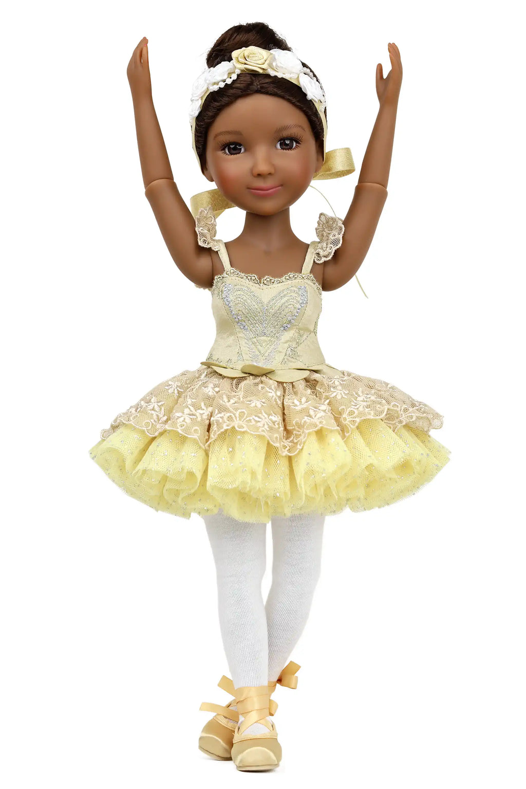 Doll in a yellow ballet outfit with white accents on a white background