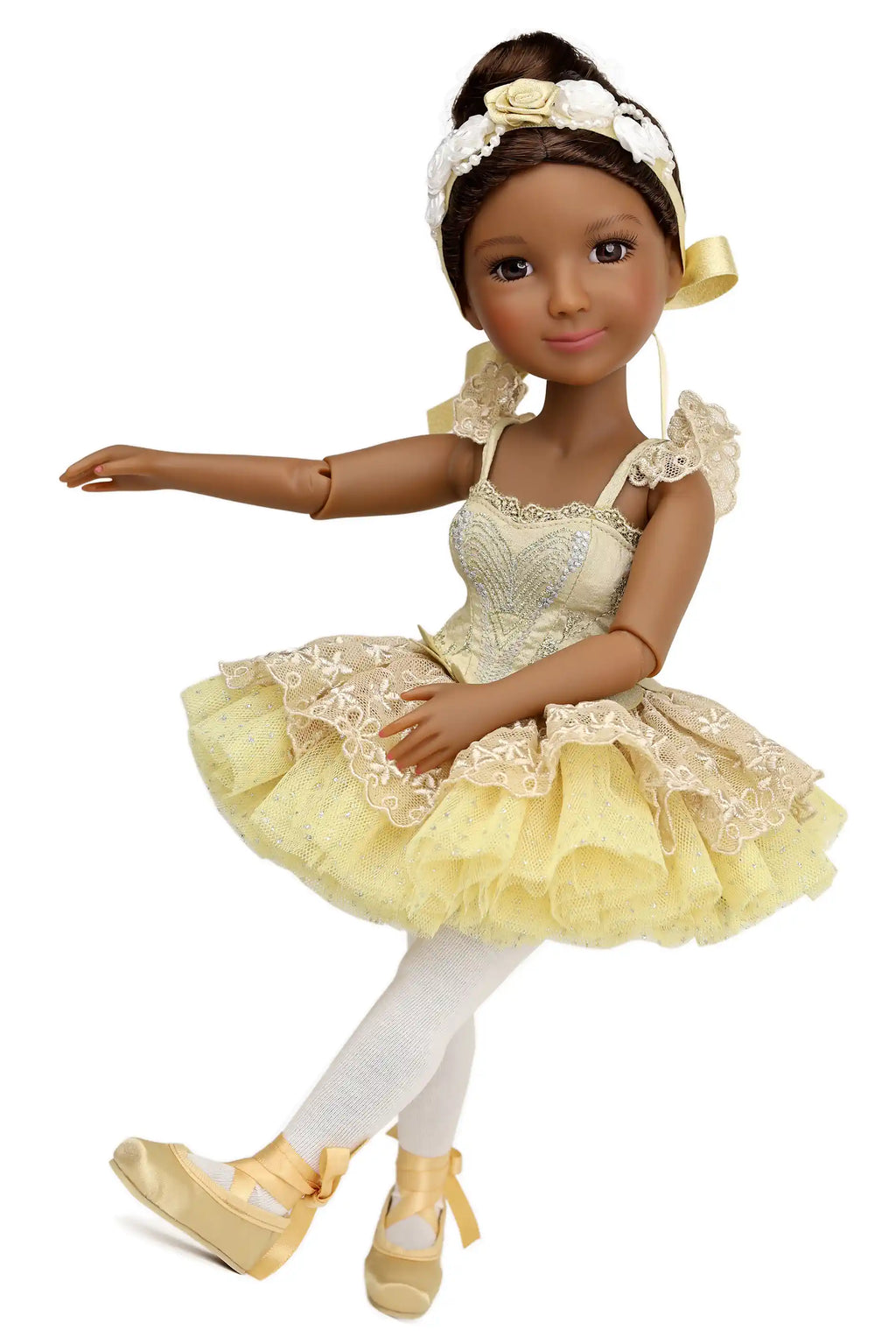 Doll in a yellow ballet outfit with white accents on a white background