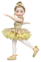 Doll in a yellow ballet outfit with a white background