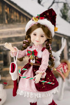 Christmas-themed doll in a festive outfit with candy canes and a Santa hat.