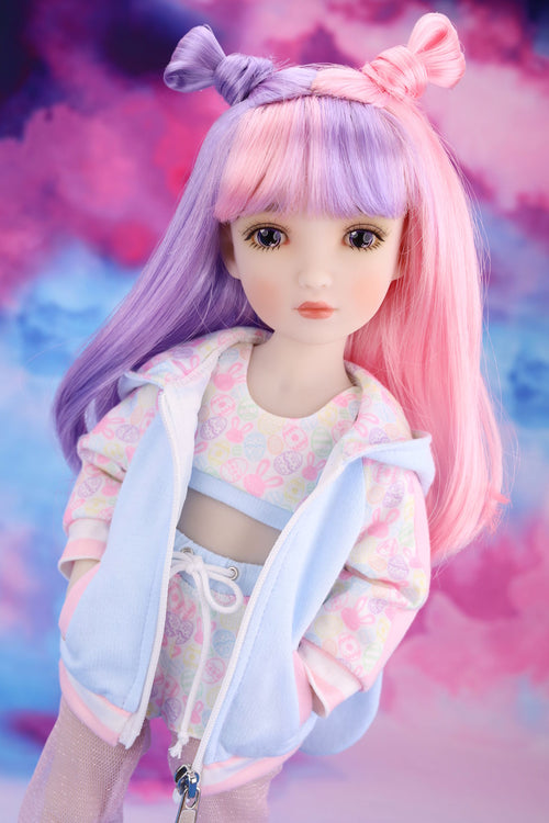 Doll with pastel-colored hair and outfit against a colorful background
