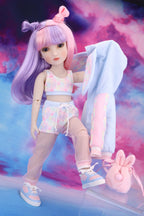 Doll with pink hair and pastel outfit against a colorful background