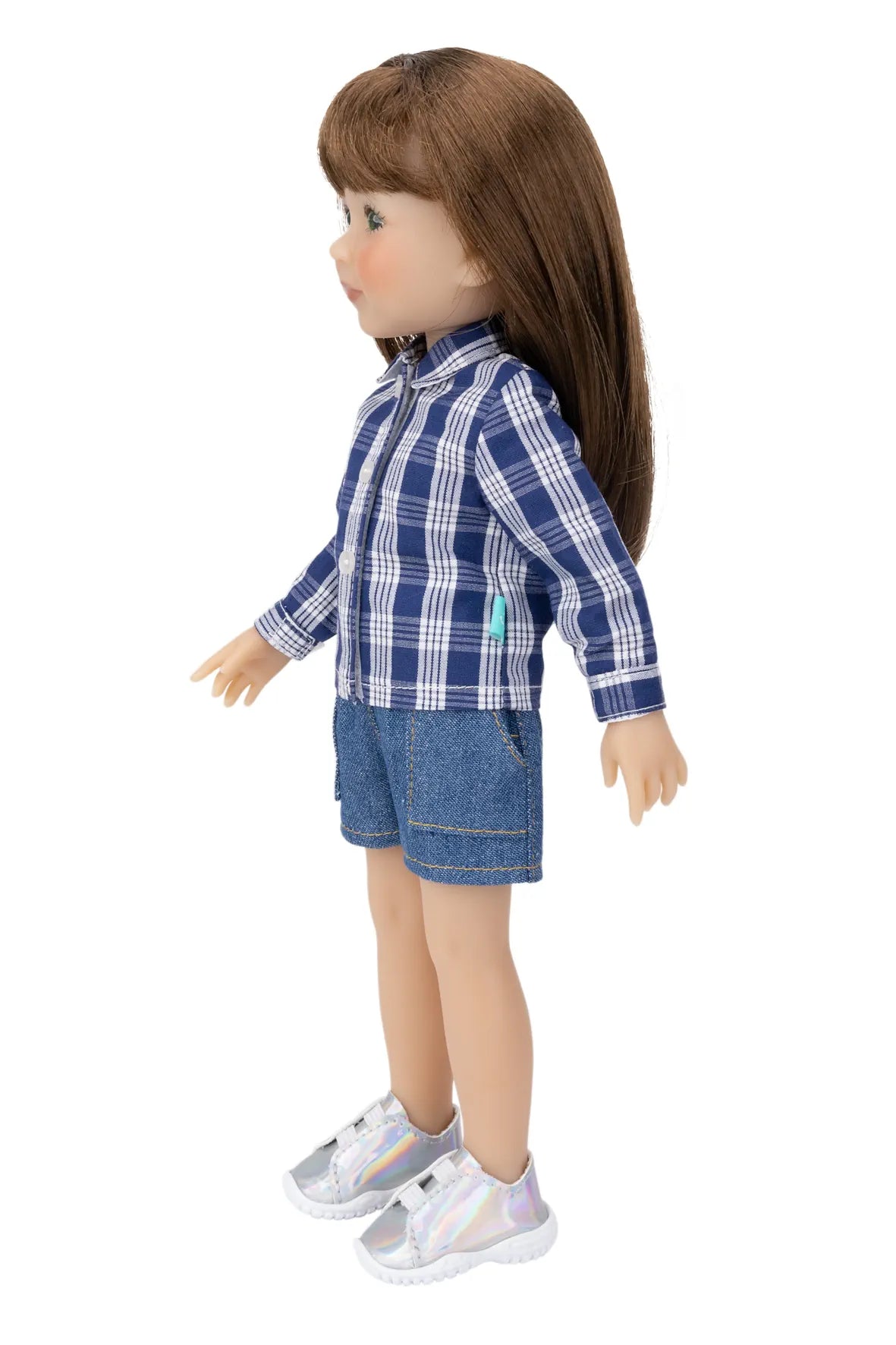 Doll wearing a blue plaid shirt and denim shorts on a white background