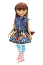 Bella wearing a denim jacket, colorful skirt, and pink shoes on a white background