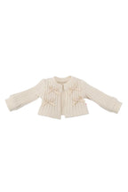 Cream-colored ribbed knit doll cardigan on a white background