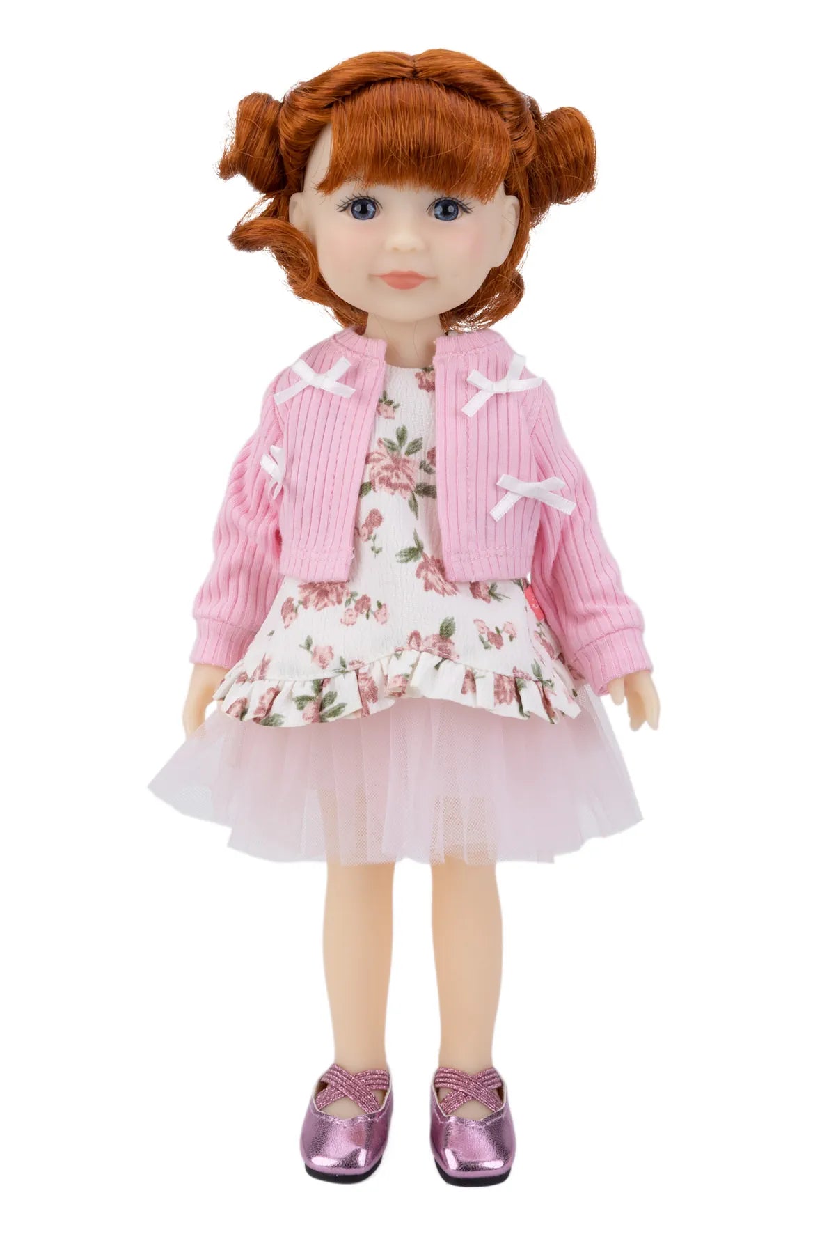 Doll with red hair wearing a pink jacket and floral dress on a white background