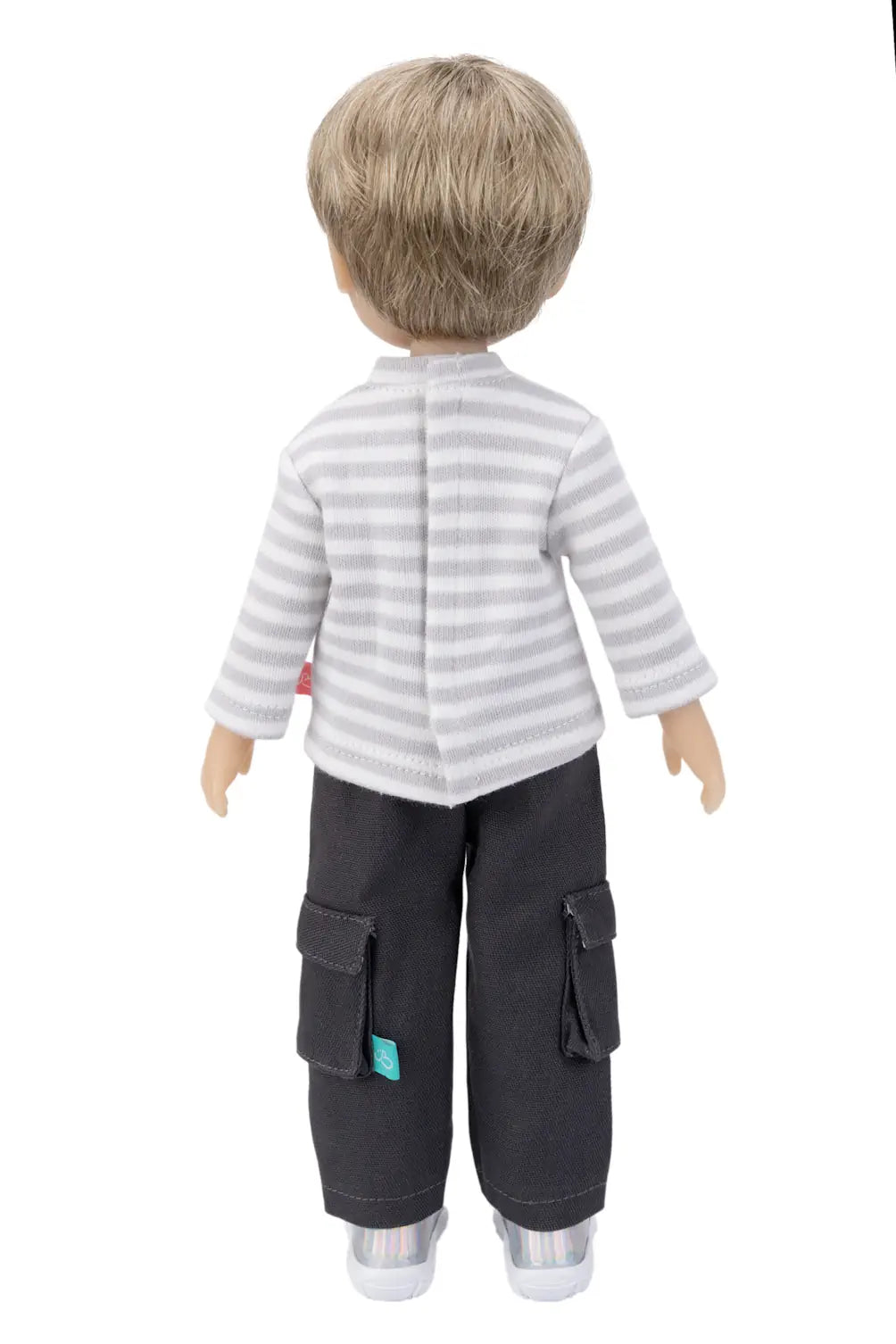 Doll wearing a striped shirt and cargo pants on a white background