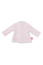 Light pink doll  shirt with a tag on a white background