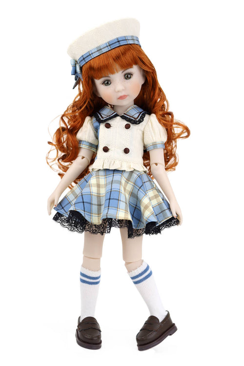 Doll with red hair wearing a blue and white checkered dress with a sailor hat on a white background