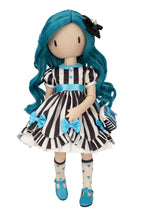 A Gorjuss doll with long bright blue hair, wearing a black-and-white striped dress with blue bows and trim, cream socks with blue hearts, and blue shoes, posed against a plain white background.