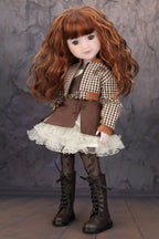 Doll with long brown hair wearing a checkered jacket, brown vest, and white lace dress against a gray background.
