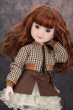 Doll with checkered jacket and brown skirt against a dark background