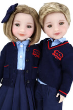Two dolls in matching navy blue outfits with red accents on a white background