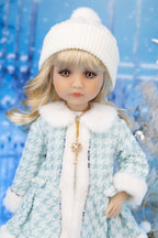 Doll wearing a light blue coat with white fur trim and a white hat against a snowy background.