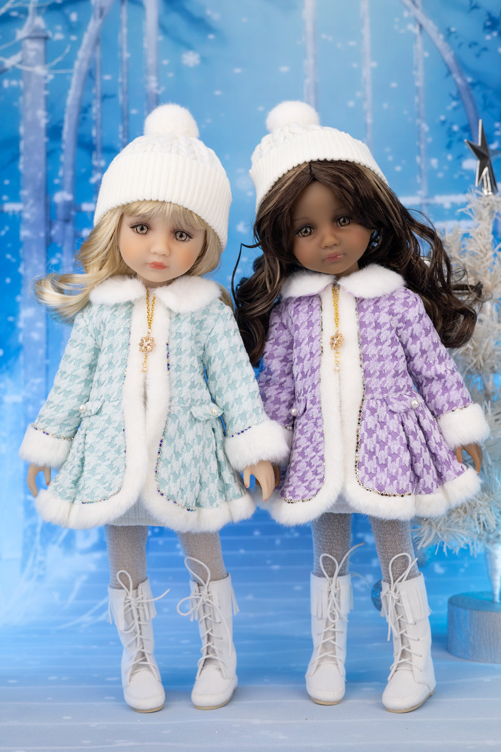 Two dolls in winter outfits with a blue snowy background