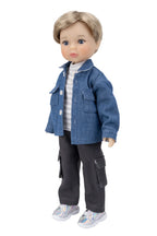 Doll wearing a blue denim jacket and gray pants on a white background