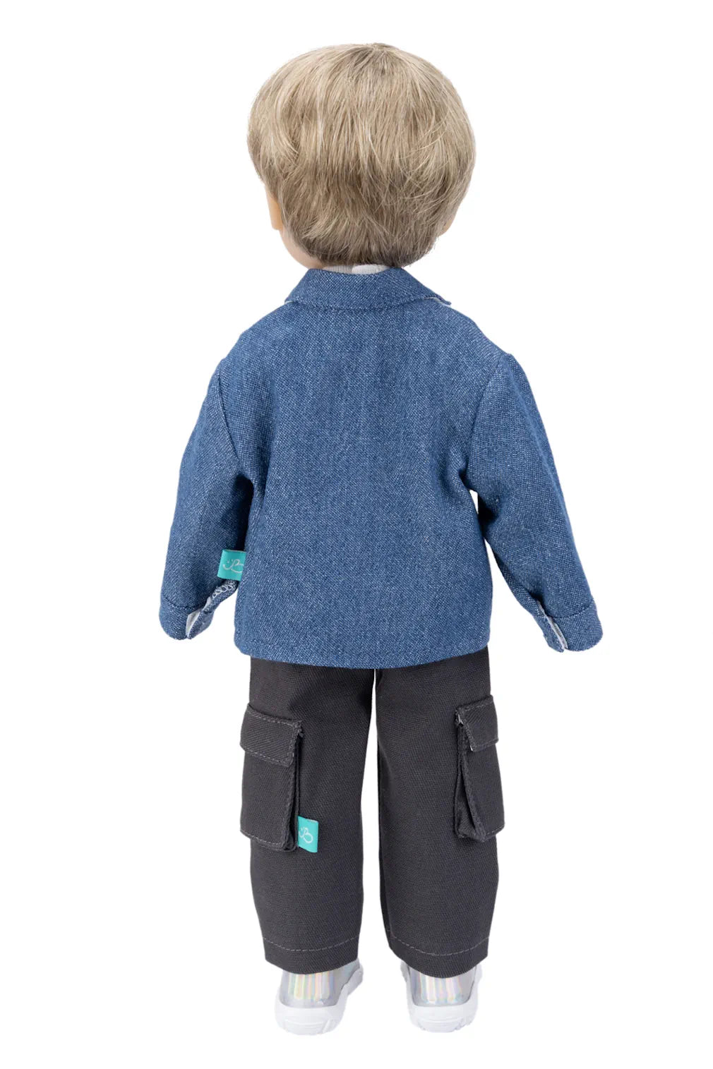 Doll wearing a blue jacket and black pants on a white background