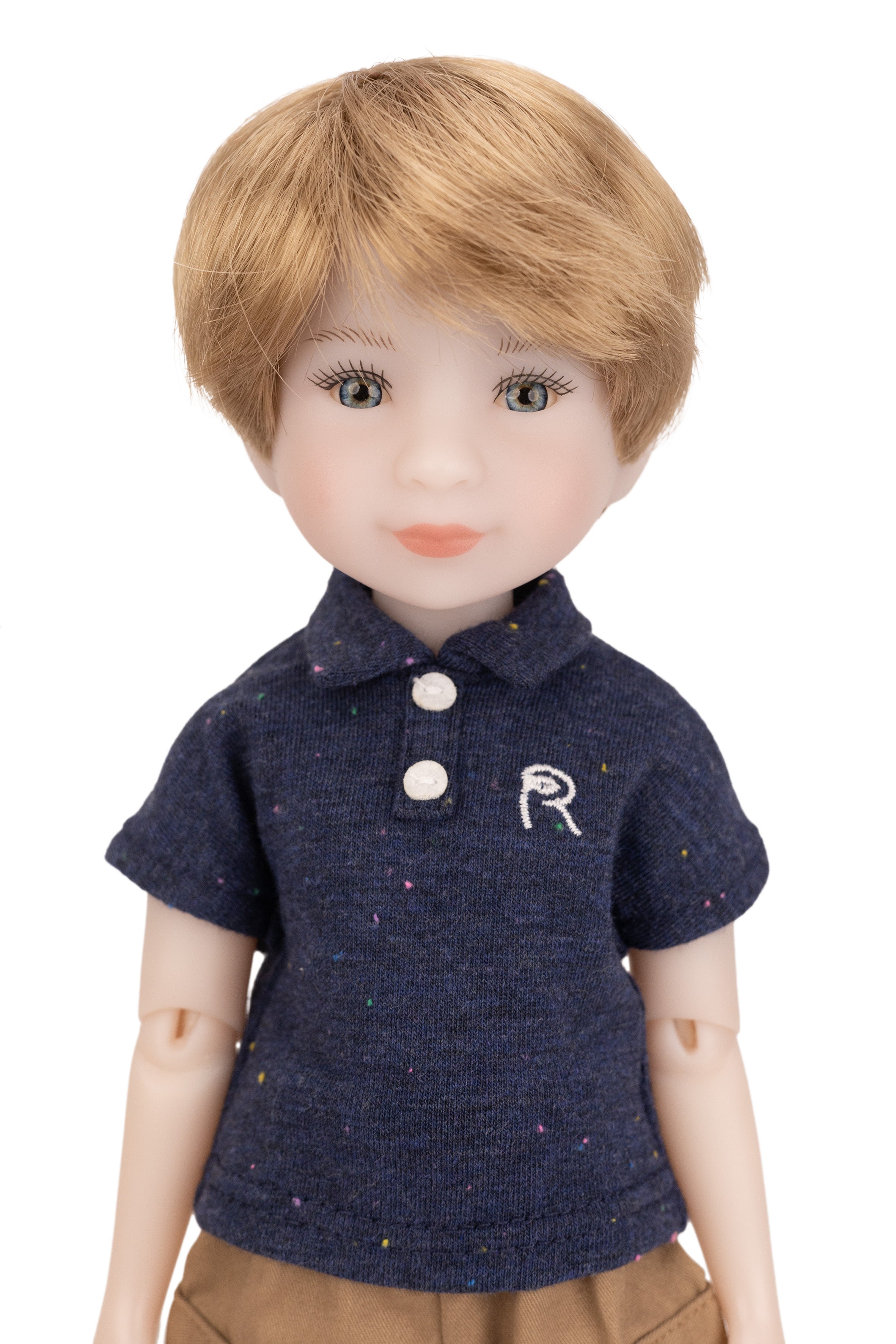 Doll wearing a navy blue polo shirt with a logo on a white background