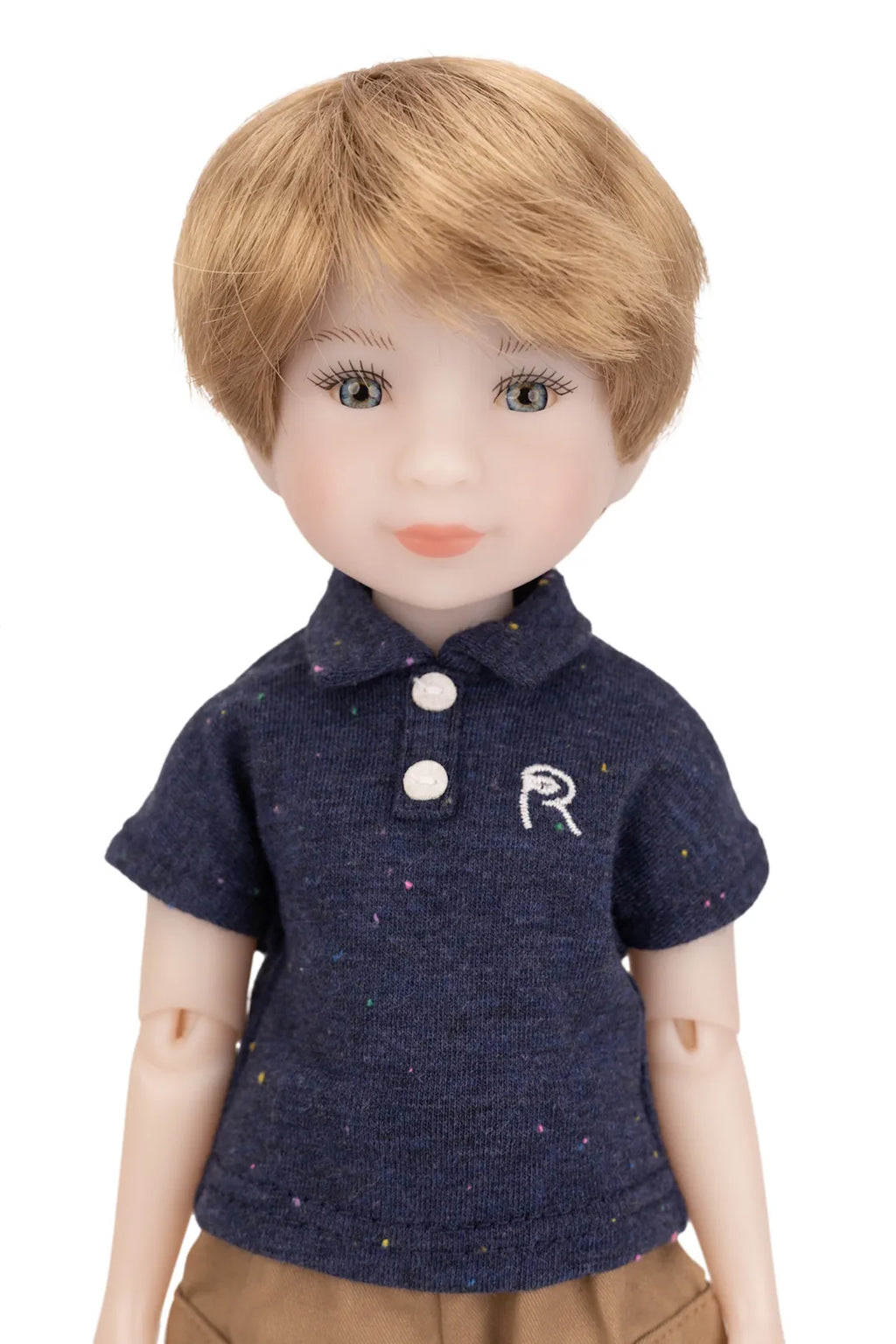 Doll wearing a navy blue polo shirt with a logo on a white background