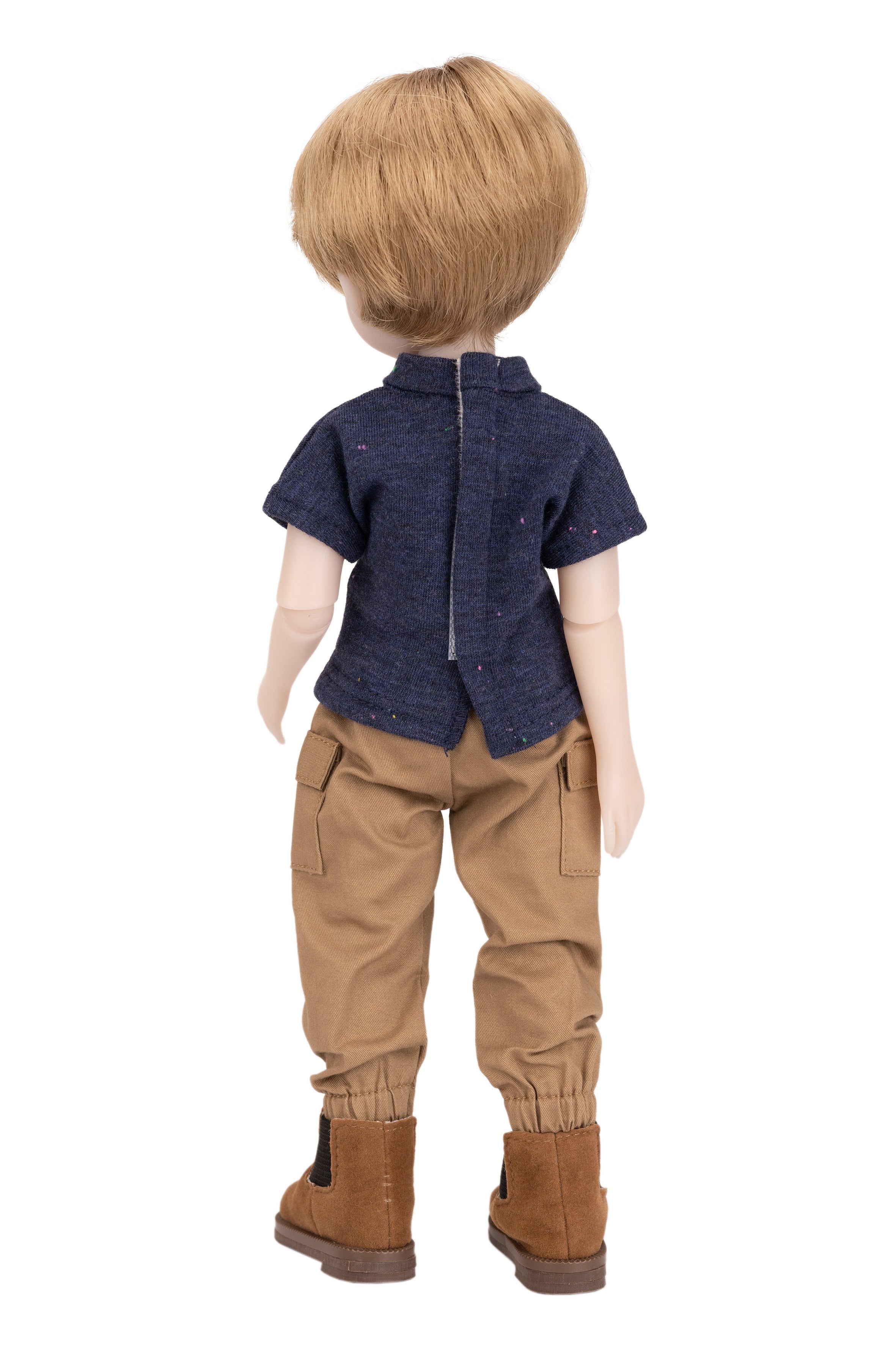 Doll wearing a navy shirt, beige pants, and brown boots on a white background