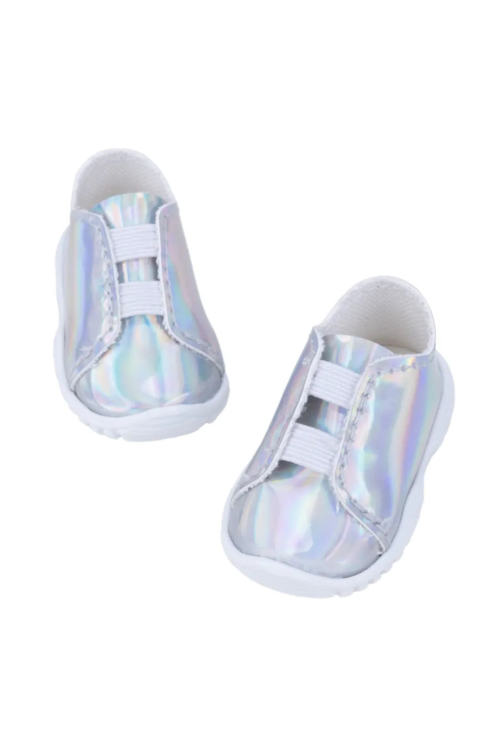 Pair of iridescent doll shoes on a white background