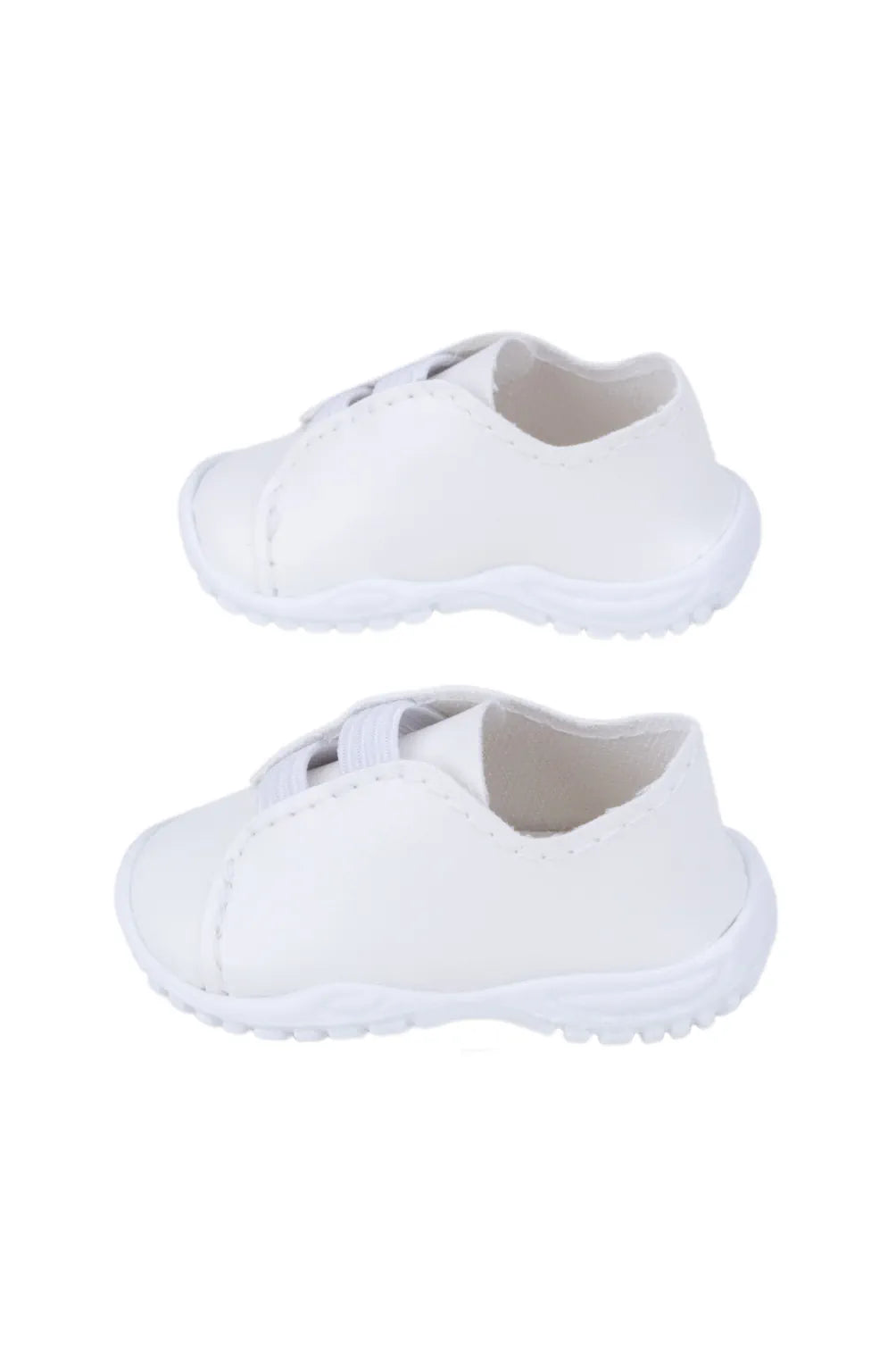 White doll sneakers on a white background