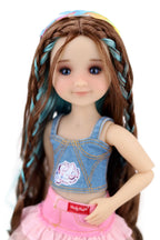 Ella with braided hair wearing a denim top and pink skirt on a white background