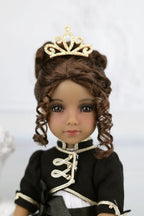 Esther with a black outfit and gold tiara on a white background