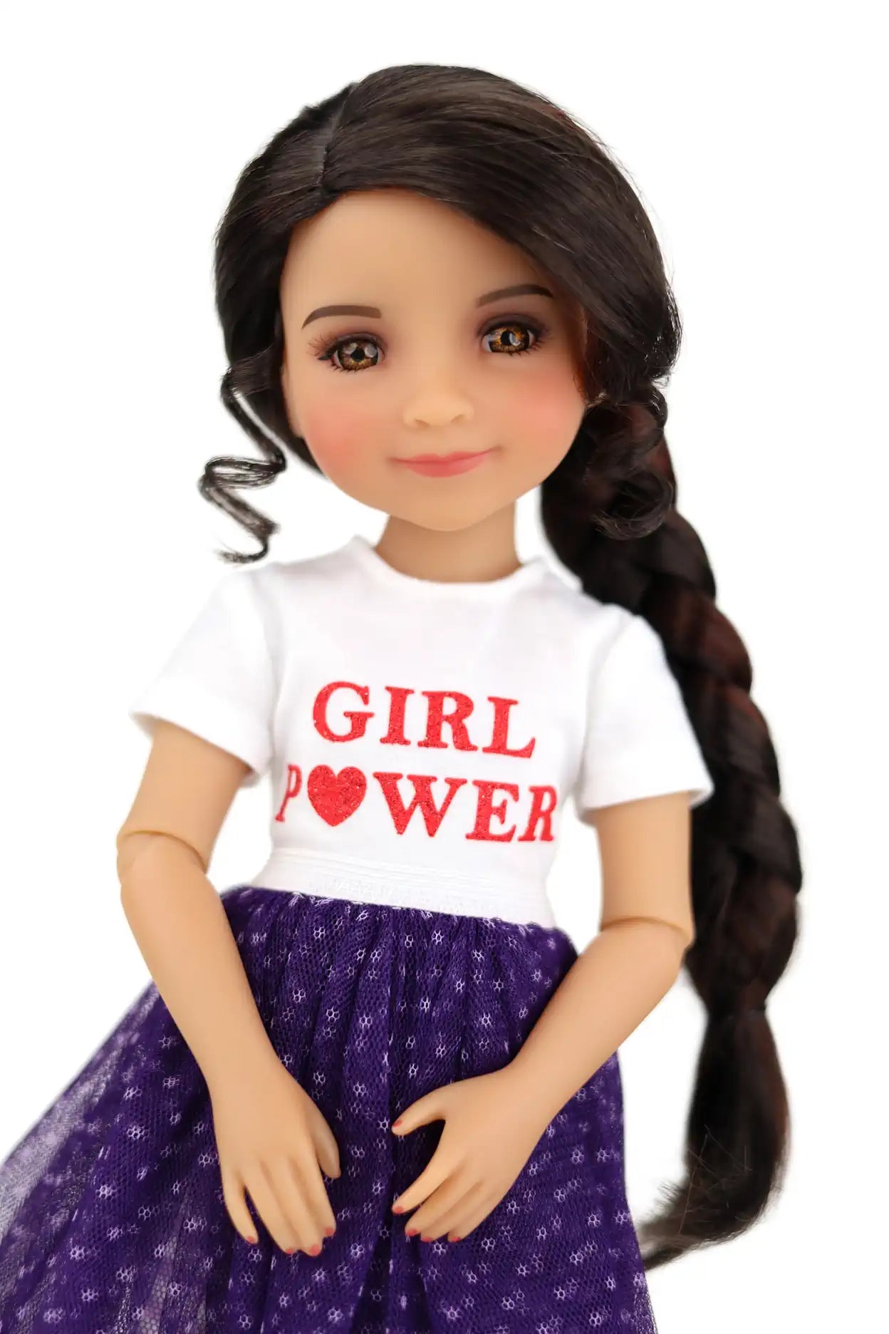 Freida wearing a white shirt with 'GIRL POWER' text and a purple skirt on a white background