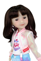 Hanna, long brown hair with pink highlights in a sheer pink jacket, white tank, and tie-dye shorts.