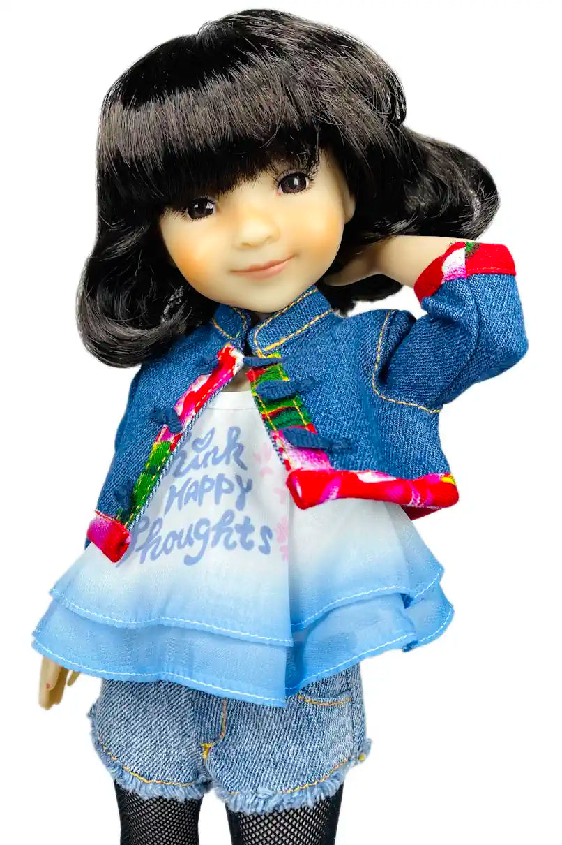 Hanna wearing a denim jacket and dress with text on a white background