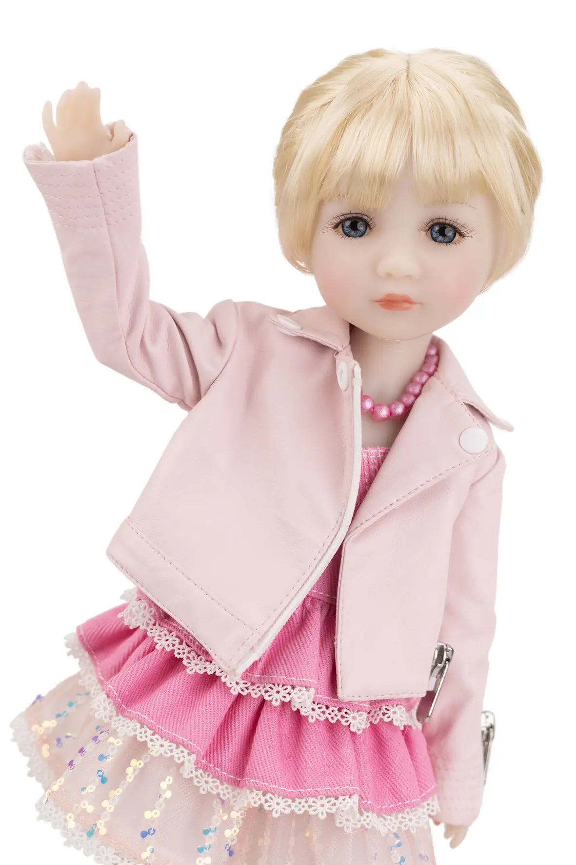 Karina wearing a pink outfit with a jacket and skirt on a white background