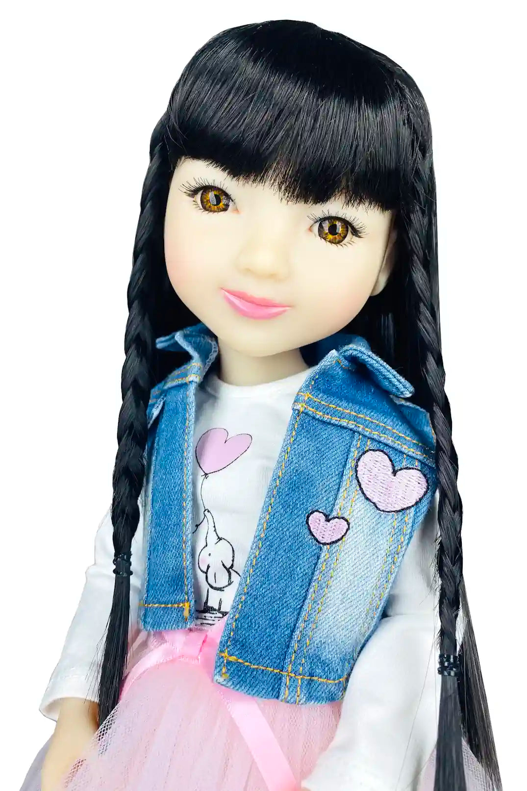 Lila with long black hair, denim jacket with heart designs, and pink skirt on a white background