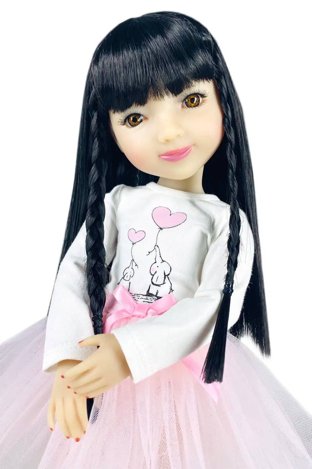 Lila with long black hair wearing a white shirt with pink hearts and a pink skirt on a white background
