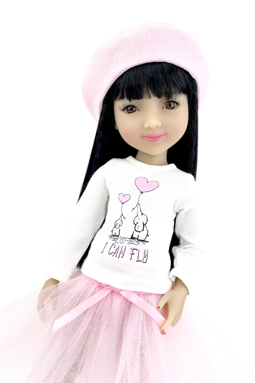 Lila wearing a white shirt with graphics and text, pink headband, and pink skirt on a white background
