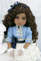Ruth in a blue and white outfit with a bow on a white background