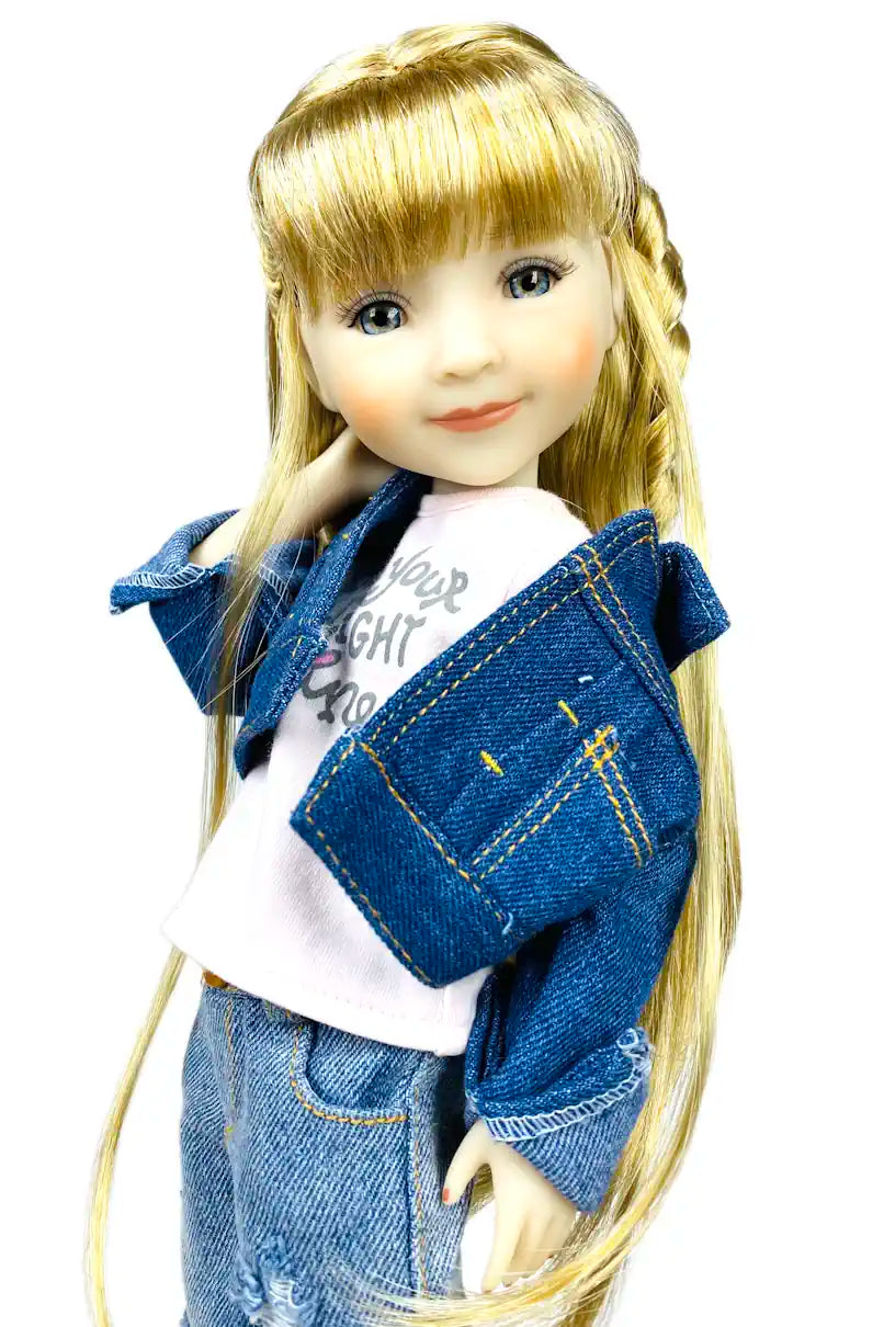 Sara wearing a denim jacket and jeans on a white background