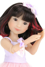 Sydney with black hair and a pink headband on a white background