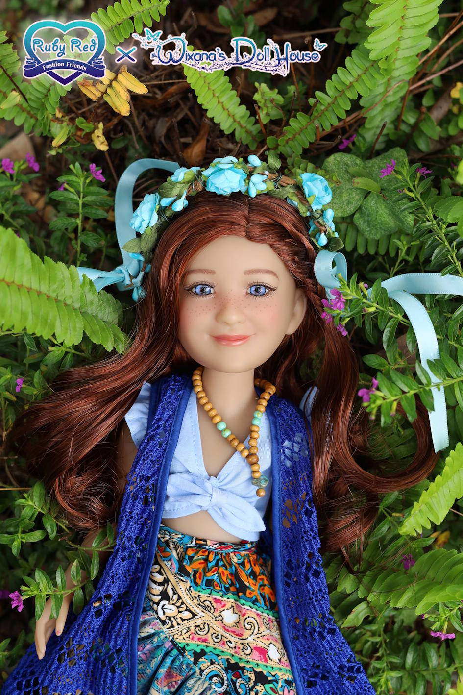 Doll with floral headpiece and blue outfit standing among green foliage