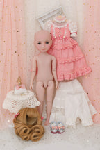 Naked doll with a pink outfit, hair, and shoes on a decorative background