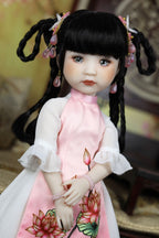 Doll with traditional attire and hair accessories