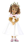 Doll in a white dress holding a smaller doll on a white background
